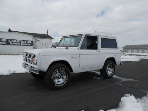 1975 ford bronco.  320 v-8. white with hard top.  newer paint, 3 speed manual