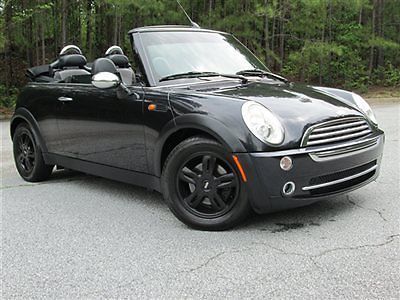 Clean carfax convertable 5 speed manual black on black rear park assist pwr top
