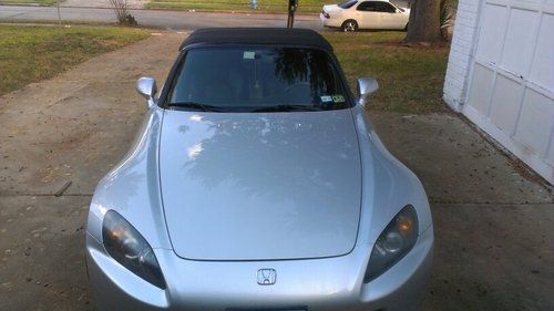 2006 silver s2000 with covertable cover, owners manual spare and jack. ap2