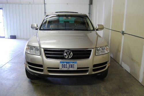 2005 vw touareg. 4wd suv. 3.2l v6. gold. very good condition. 79,791 miles.