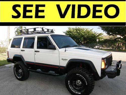 1996 jeep cherokee sport,6 inch lift,leather, custom work,see video,no reserve