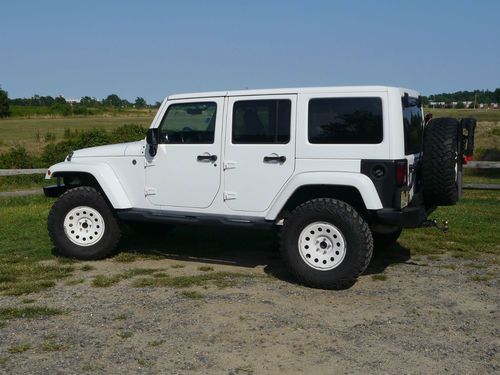 2011 jeep wrangler unlimited sahara - ome 2.5" lift / steel bumpers / 35" / cb
