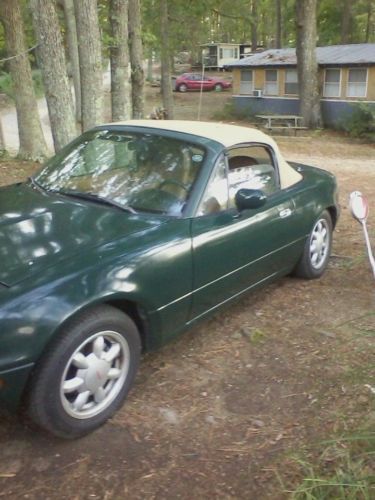 1991 mazda miata, leather int. ,hunter green with brown top, automatic trans,