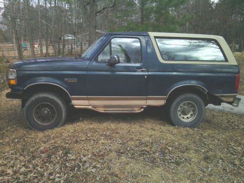 Green and tan 1995 eddie bauer ford bronco