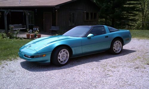 91 corvette , turquoise metalic