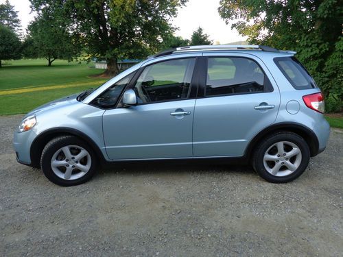 Fully loaded 2009 vapor blue metallic automatic suzuki sx4 crossover awd touring