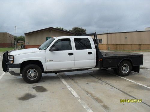 2005 chevrolet 3500hd crewcab 6.6 duramax with skirted flatbed
