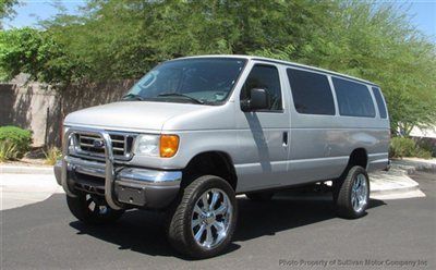 Custom lifted 2006 ford e-350 passenger van with tons of seating