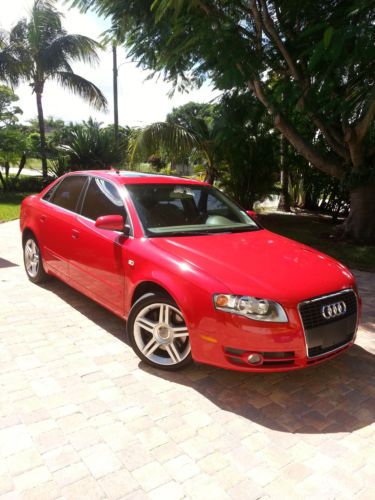 60,550 miles - premium package - red - excellent condition with low miles