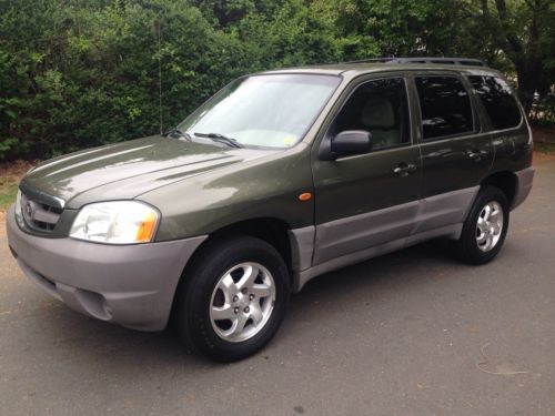 2002 mazda tribute 4cyl ,4x4 , manual 5peed! so clean you can eat off it!! wow!!