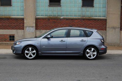 Gray hatchback, very low miles, great condition