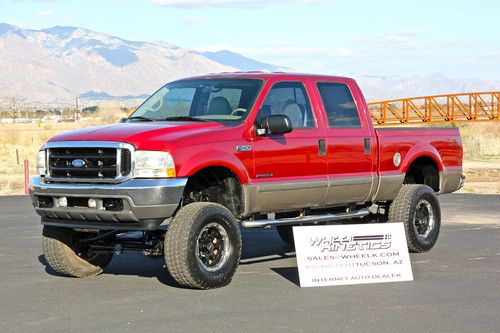 2002 ford f250 diesel 4x4 lariat crew cab 8in lift 4wd 7.3l leather see video