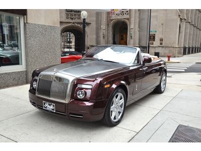 2010 rolls royce phantom drophead.  madeira red with seashell.