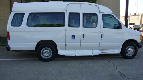 2003 ford e350 handicap 10 passanger van with 2 wheel chair and automatic steps