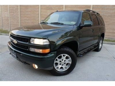 03 chevy tahoe z71 4x4 low miles sunroof leather 6 disk changer priced to sell!!