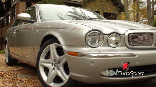 Stunning 06 xjr supercharged rear dvd ent xenon nav only 31k free ship w/ bin!