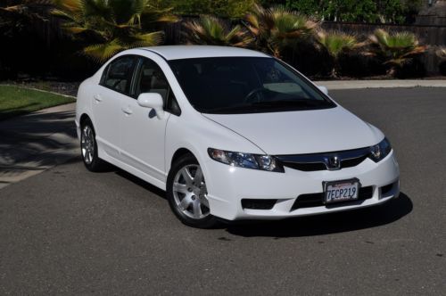 White super clean non-smoker well maintained reliable 36 mpg 4dr sedan must see