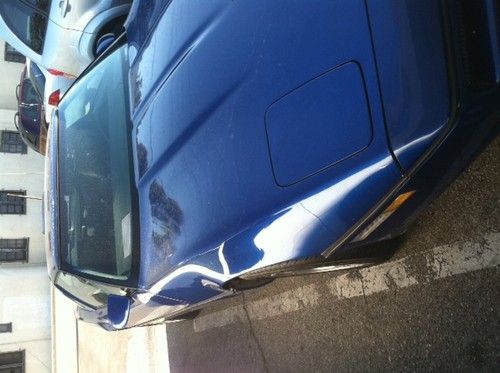 1986 corvette, 86,000 miles, targa top, tuned port injection, metallic blue.