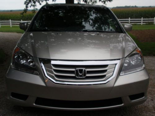 2008 silver honda odyssey with 64,134 miles
