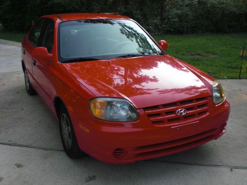2004 hyundai accent sedan 4-door 1.6l (red)