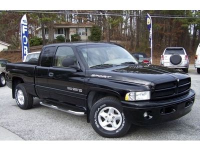 A-super-nice-quad-cab-4-door-5.9l-leather-loaded-tow-cd-parked-in-showroom-truck