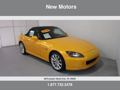 2006 honda s2000 convertible 2.2l in rio yellow with a black top