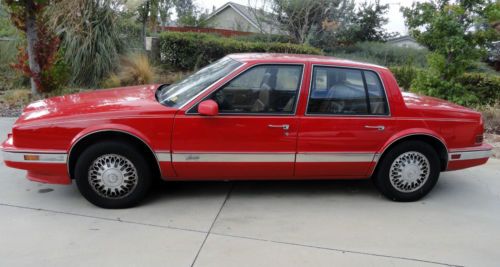 1991 cadillac seville 61,423 miles on odometer. red. for parts or restorationj