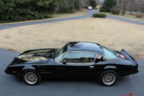1979 pontiac trans am.....slick and black....woring air....17 inch wheels