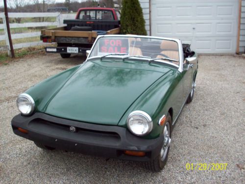 1976 m.g. midget  looks great drives great   65k actual miles