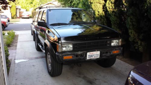 Black, good condition, 4wd, automatic transmission, electric windows, 1995