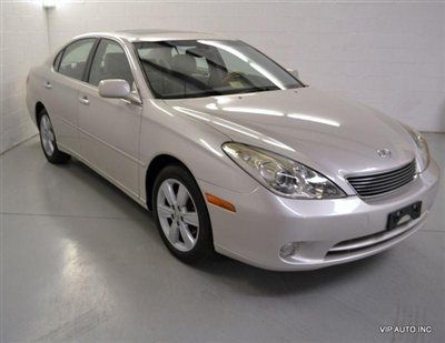 Xenon / cd changer / sunroof / low miles / heated &amp; a/c seats / wood wheel