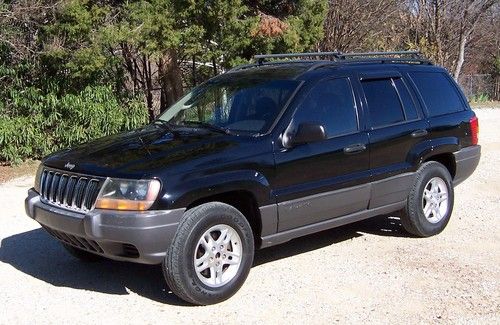 2002 jeep grand cherokee laredo - v/8 - black on black - extra clean in and out