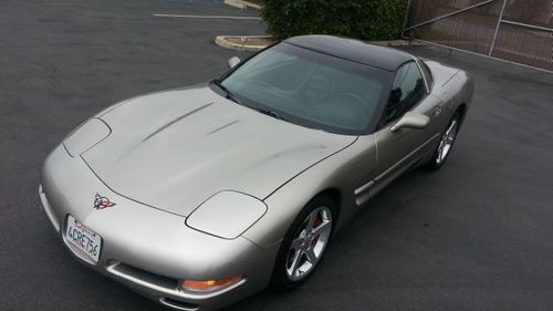98 corvette very clean and beautiful car! glass top!! summers here!