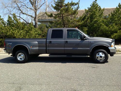 Ford f-350 7.3l 4x4 dually lariat crew cab 8'bed