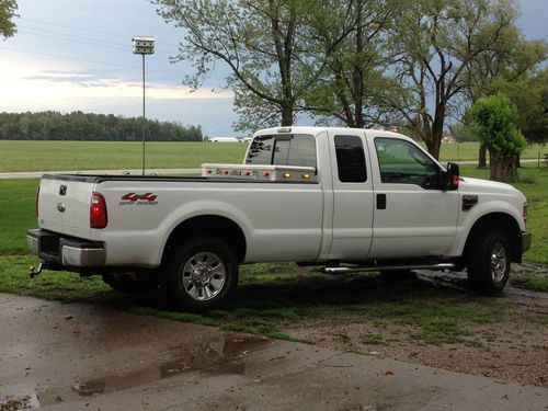 08 f250 powerstroke ext. cab long bed, white, stock