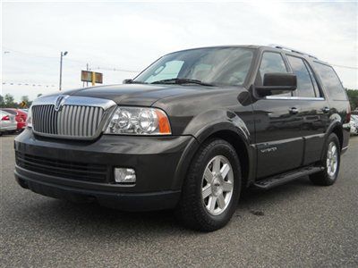 We finance! 4x4 leather roof navigation dvd non smoker carfax certified!
