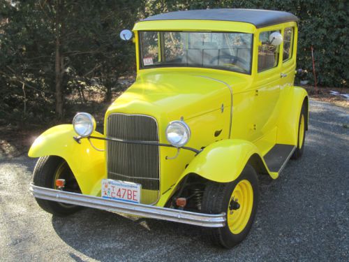 Yellow 1931 model a ford (with model b grille and small block chevy engine)
