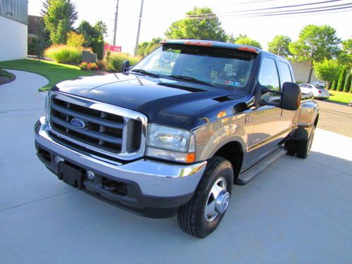 Dually turbo diesel lariat lifted  4x4 ! second  tank !warranty!serviced ! 04