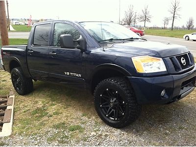 2012 titan pro 4x crew cab leather new wheels and tires we finance
