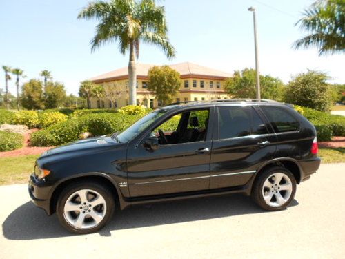 Beautiful 2005 bmw x5 4.4i awd navigation-sports package-black on black! 06 07