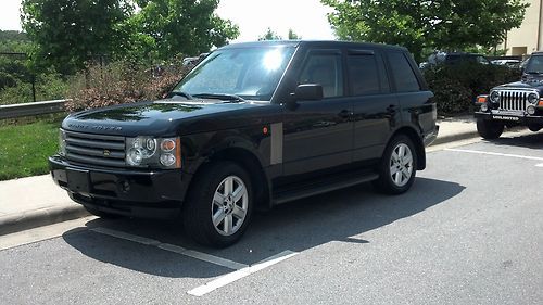 Black range rover 2004, factory dvd players wirless headphones, 80k, garage kept