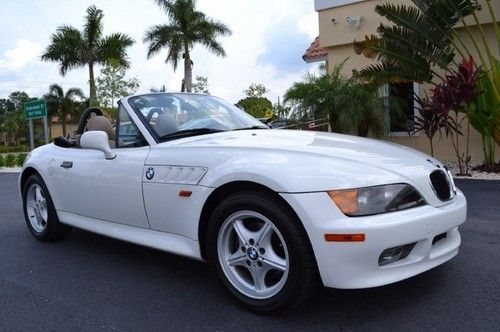 Convertible leather 5 speed manual premium package carfax cert 42k new tires