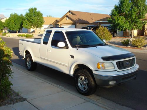 2000 ford f150 4x4 xlt extended cap clean title