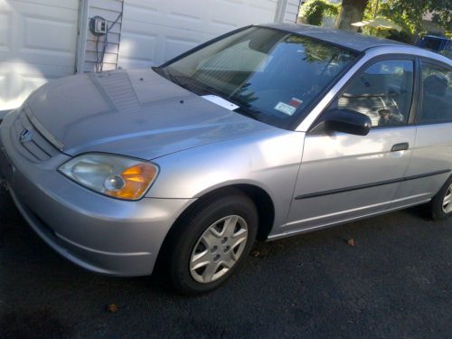 Honda civic 2003 dx automatic 4 doors runs and drive need  gas cable flood car