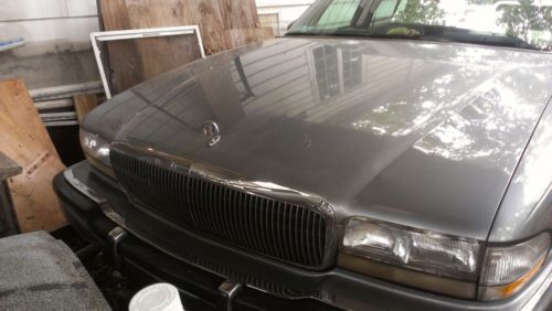 1994 buick park ave  73,000 miles , needs trans , axle and battery