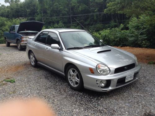 03 subaru wrx  runs/ flawlessly. fly in and drive home.no issues