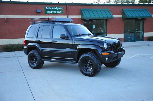 Liberty limited 4x4 / 1 owner / brand new lift, tires, wheels, rack / like new