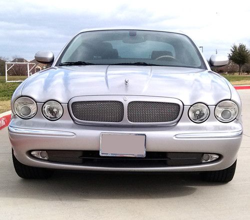 2005 jaguar xjr  --  silver with black leather / wood interior  --  all options