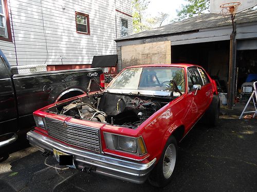 1978 chevy malibu . red. body only!!! modified for racing. roll bars included.