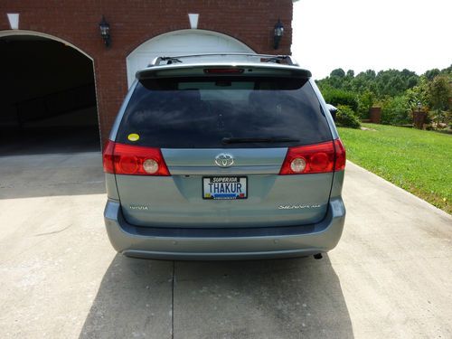 Teal colored toyota sienna xle - good condition - 7 seater